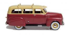 1949-53 Chevrolet Suburban avec jupes latérales et porte arrière rouge-beige